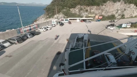Ferry docking in with the ramp opening Stock Footage 242863902