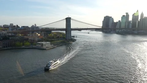 Ferry on East River speeding toward Brooklyn Stock Footage 194353146