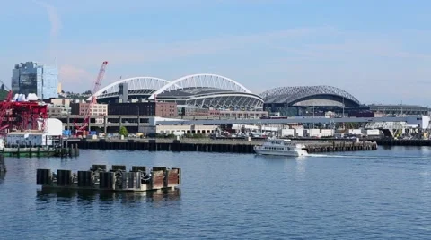 Ferry Entering Seattle in Front of Stadiums Video stock 51789378