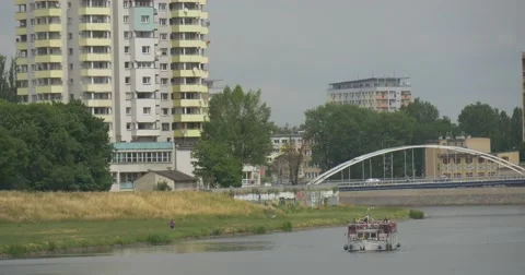 Ferry Floats Along a River Stock Footage 51651379