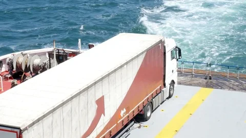 Ferry freight. Lorry on an open deck of a vessel crossing a sea. 動画素材 82910241