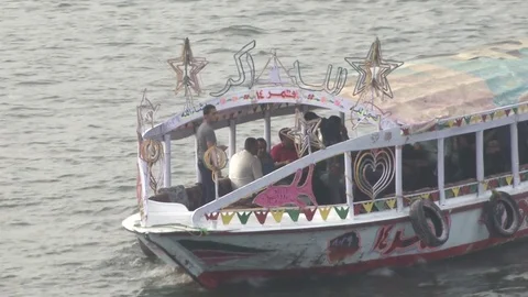 Ferry going down Nile River in Egypt Stockbeeldmateriaal 82320608