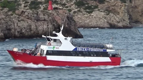 Ferry inter islands sailing close to the coast of Ibiza. Stock Footage 119009352