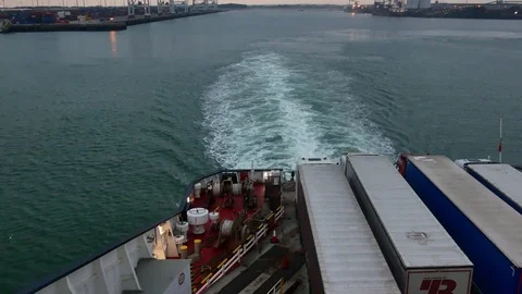 A ferry leaves the harbor of Dunkirk with big lorries Stock Footage 102528025