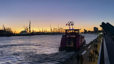 Ferry leaving Landungsbrücken pier Stock Footage