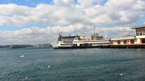 Ferry leaving Pier on a Cloudy Day at Bosphorus Sea Stock Footage 106123736