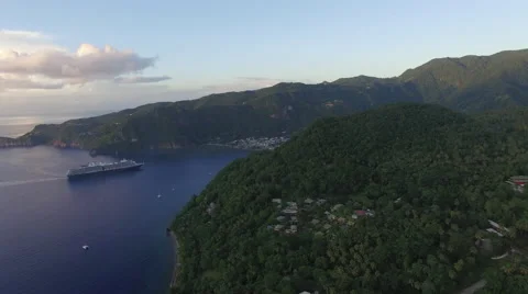 Ferry by the mountain as the sun sets Stock Footage 66340152