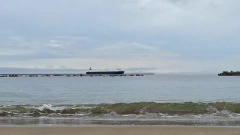 A ferry moving to the right on the horizon Stock Footage 244044225