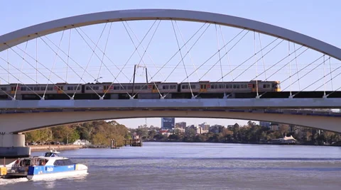 Ferry passes under trains 库存影片 39886885