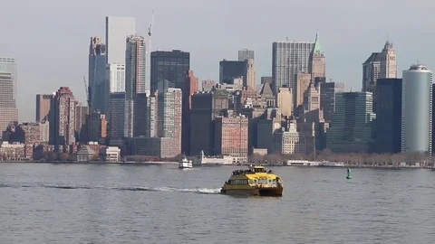 Ferry passing Midtown Manhattan skyline, seen from Liberty Island Stock Footage 81007328