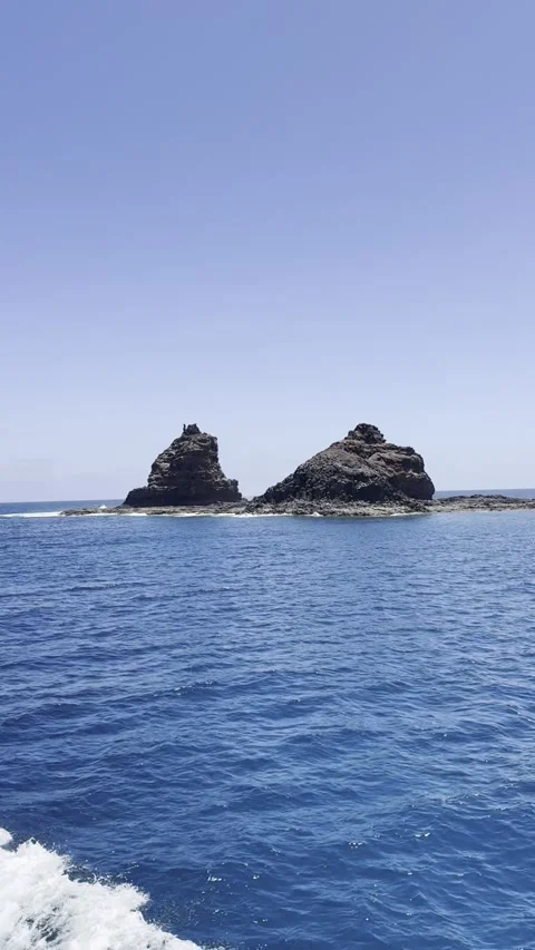 Ferry Passing Punta Fariones and the Deep Blue Atlantic of Lanzarote Stock Footage 321815502