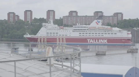 Ferry passing by in a Swedish harbor  Stock Footage 64552354
