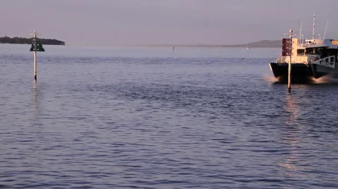 Ferry passing through markers Stock Footage 39946894