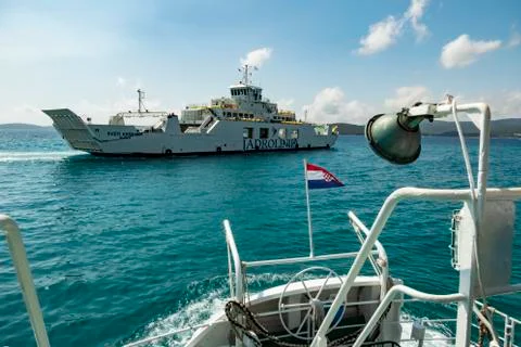 Ferry sailing between Orebic and Korcula island. Stock Photos