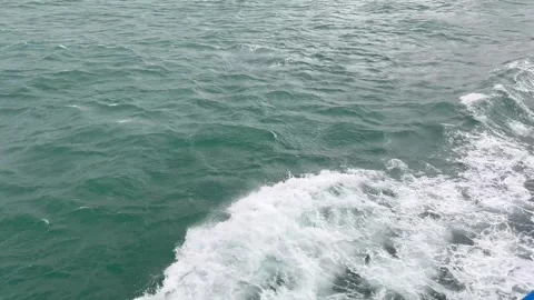 The ferry sailing fast in the sea splashes beautiful water Stock Footage 248304088