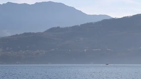A ferry sailing on the lake in the waves Stock Footage 73447254