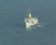 Ferry sailing through sea towards camera SD Footage