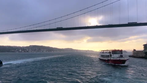 The ferry sails along the Bosphorus against the backdrop of the Bosphorus Bridge Stock Footage 203815378