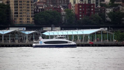 Ferry Sails Along Brooklyn Stock-Footage 77394033
