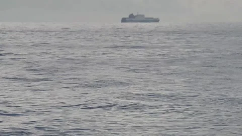 Ferry ship on the horizon Stock Footage 143453442