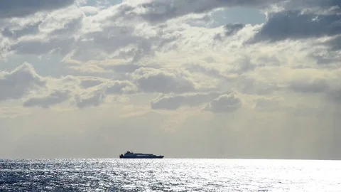 Ferry ship sails on the sea after a summer storm Stock Footage 83887232