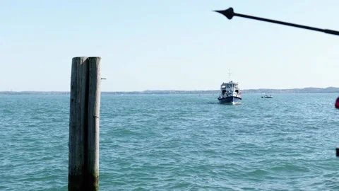 A ferry is slowly approaching the camera Stock Footage 239094581