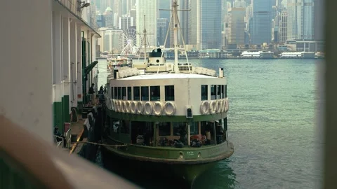 Ferry Star is docking at pier, famous transport in HongKong island Stock Footage 245486441