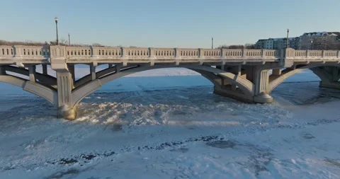 Ferry Street Bridge In Winter Champlin Minnesota - Drone Shot Up and Over Stock Footage 228894235