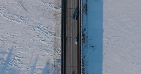 Ferry Street Bridge In Winter Champlin Minnesota - Reverse Drone Shot Top View Video stock 228894239
