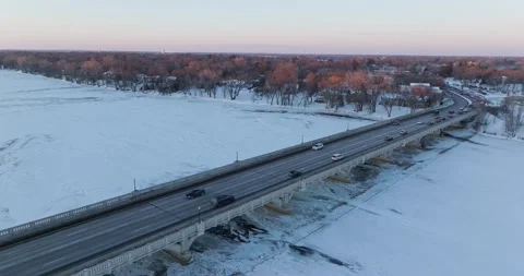 Ferry Street Bridge In Winter Champlin Minnesota - Wide Reverse Drone Shot Video stock 228894507