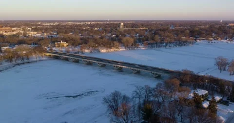 Ferry Street Bridge In Winter Champlin Minnesota - Rotating Drone Hyperlapse Stock Footage 228894659