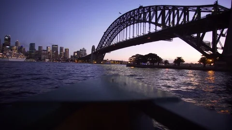Ferry to Sydney CDB harbor with sunset illuminated city building Stock Footage 124909339