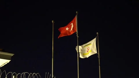 Ferry Terminal at Night with Flags, Silent Şehir Hatları Dock in Istanbul Stock Footage 300891942