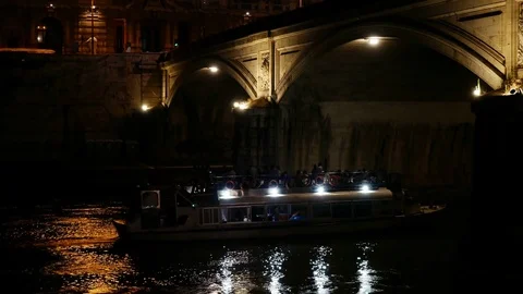 Ferry touristic boat navigating on Tiber river at night Rome Italy Stock Footage 77425644