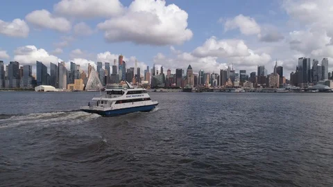 Ferry Turning Sideways in Front of Drone Over Hudson Stock Footage