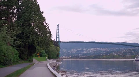 Ferry under the bridge in Vancouver Stock Footage 51586606
