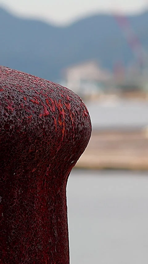 Ferry View Framed by an Abandoned and Rusted Mooring Bollard,02 库存影片 343822466