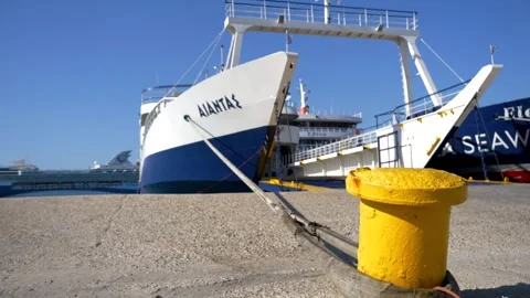 A ferry waiting for loading, docked at the port on the shores of the Stock Footage 247532815