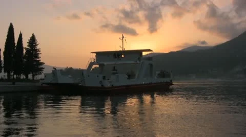 Ferryboat in bay at sunset Stock Footage 12525310