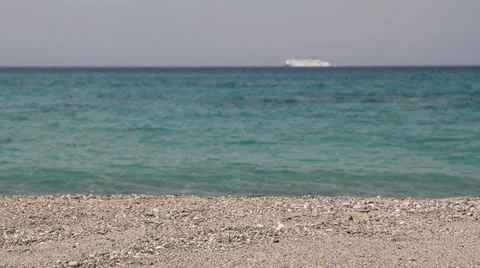 Ferryboat sailing on the horizon Stock Footage 25979083