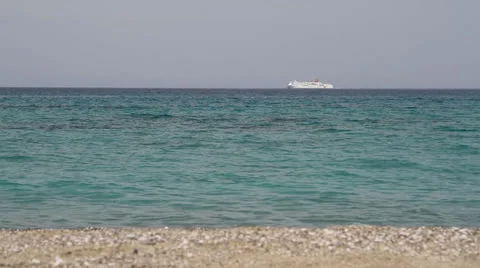 Ferryboat sailing on the horizon Stock Footage 25985043