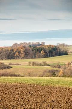 Fertile fields, meadows, forests and green and brown soil Stock Photos