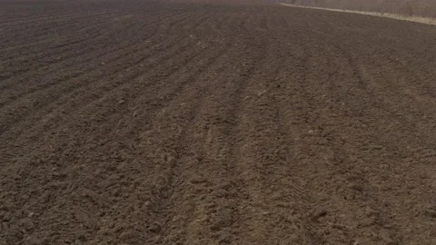 Fertile soil prepared for spring sowing 4K drone video Stock Footage 105302331