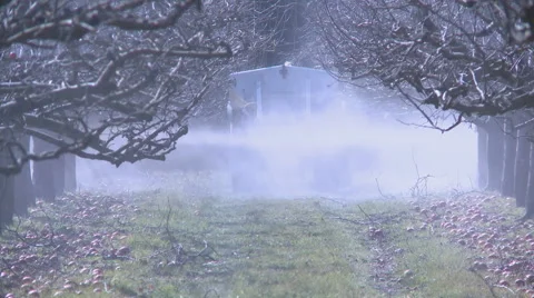 Fertiliser spreader orchard Stock Footage 42126311