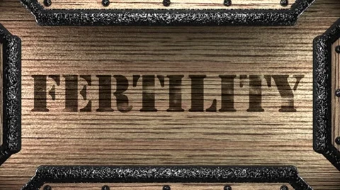 Fertility on wooden stamp Stock Footage