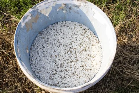 Fertilizer in can Stock Photos