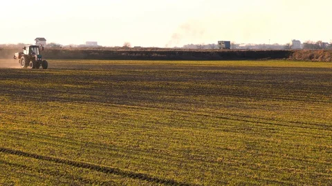 Fertilizer spreading on the field. Stock Footage 85972071