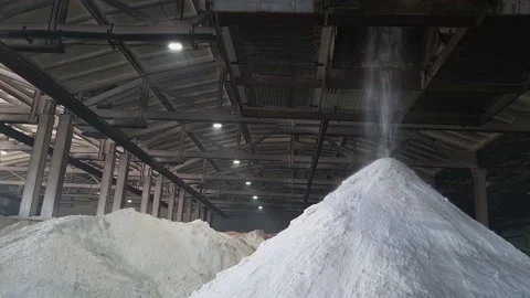 Fertilizers powder pour in a pile inside a warehouse of chemical plant. 스톡 동영상 160139934