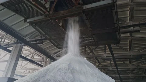 Fertilizers powder pour in a pile inside a warehouse of chemical plant. Video stock 160991786