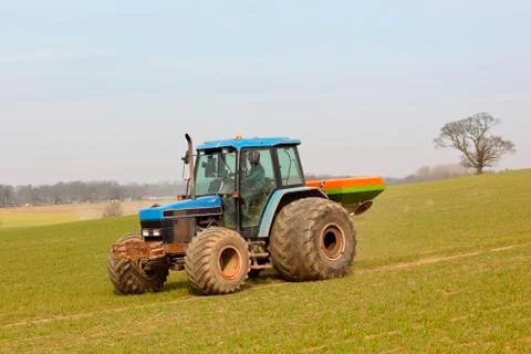 Fertilizing fields in spring Stock Photos